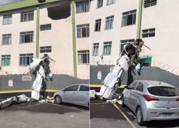 Avião de pequeno porte colide com prédio e cai em estacionamento em BH; acidente deixa dois mortos